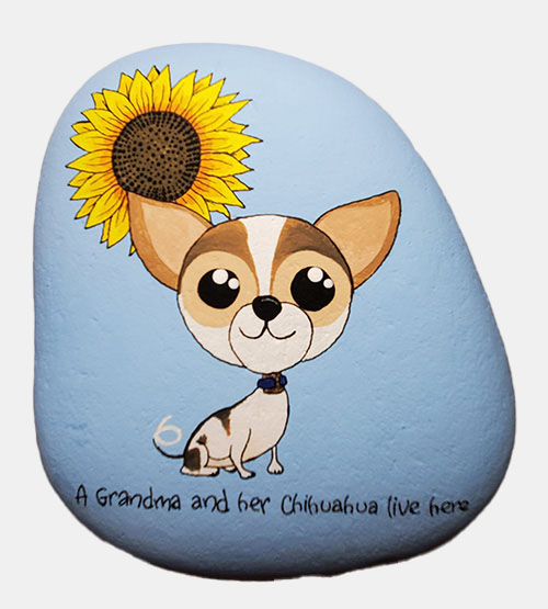 hand painted rock of a dog and a sunflower with text A grandma and her Chihuahua live here