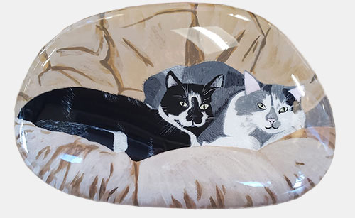 hand painted rock of two cats