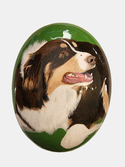 hand painted rock of a dog