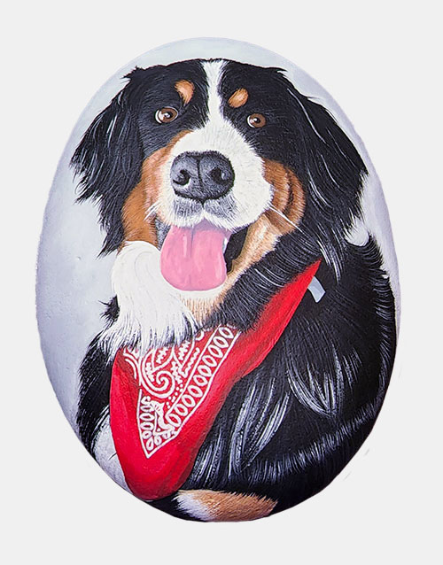 hand painted rock of a dog