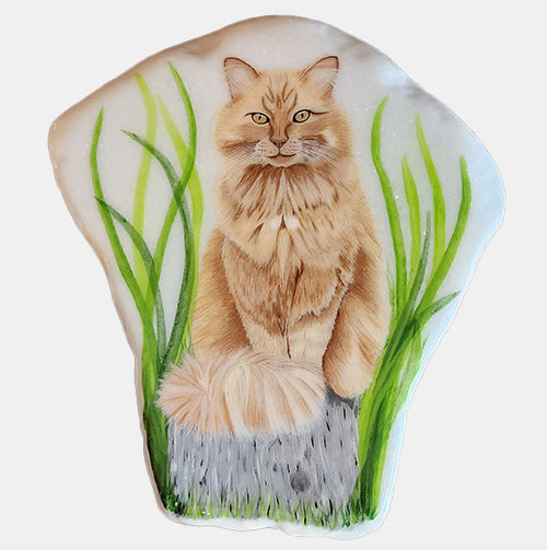 hand painted rock of a cat